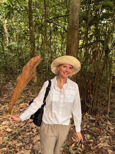 Dressed for the Amazon jungle: long sleeves, hat, light layers